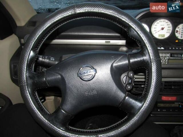 Серый Ниссан ИксТрейл, объемом двигателя 2 л и пробегом 197 тыс. км за 6500 $, фото 5 на Automoto.ua