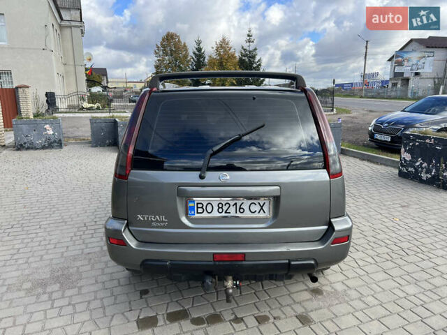 Серый Ниссан ИксТрейл, объемом двигателя 2.2 л и пробегом 468 тыс. км за 5500 $, фото 3 на Automoto.ua