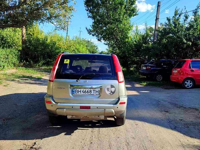 Сірий Ніссан ІксТрейл, об'ємом двигуна 2.5 л та пробігом 390 тис. км за 5000 $, фото 3 на Automoto.ua