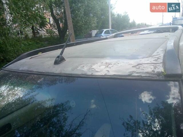 Серый Ниссан ИксТрейл, объемом двигателя 2 л и пробегом 241 тыс. км за 3800 $, фото 12 на Automoto.ua