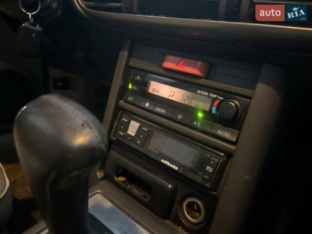 Серый Ниссан ИксТрейл, объемом двигателя 2.5 л и пробегом 320 тыс. км за 4800 $, фото 6 на Automoto.ua