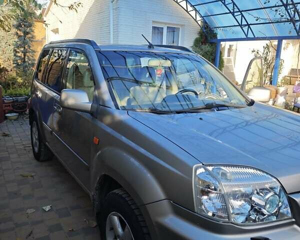 Сірий Ніссан ІксТрейл, об'ємом двигуна 2 л та пробігом 320 тис. км за 5500 $, фото 9 на Automoto.ua