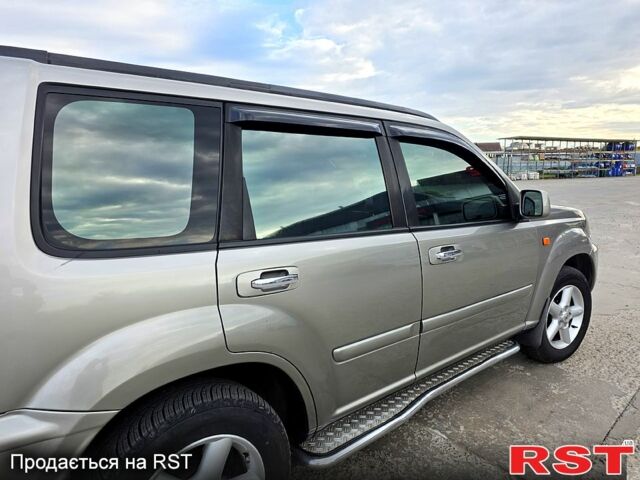 Серый Ниссан ИксТрейл, объемом двигателя 2 л и пробегом 220 тыс. км за 5800 $, фото 7 на Automoto.ua