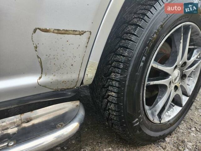 Серый Ниссан ИксТрейл, объемом двигателя 2.5 л и пробегом 450 тыс. км за 7000 $, фото 13 на Automoto.ua