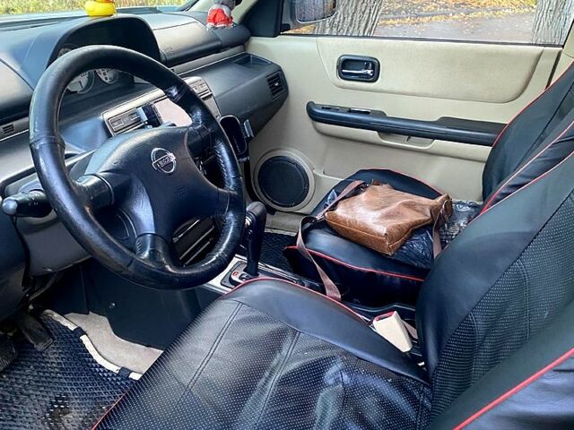 Серый Ниссан ИксТрейл, объемом двигателя 2 л и пробегом 251 тыс. км за 5600 $, фото 9 на Automoto.ua