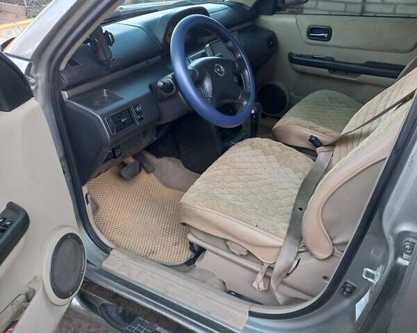 Сірий Ніссан ІксТрейл, об'ємом двигуна 2 л та пробігом 253 тис. км за 5500 $, фото 7 на Automoto.ua