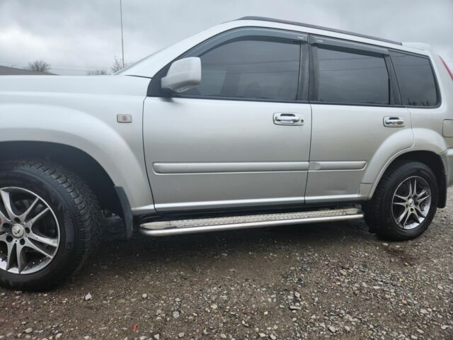 Сірий Ніссан ІксТрейл, об'ємом двигуна 2 л та пробігом 450 тис. км за 7000 $, фото 6 на Automoto.ua