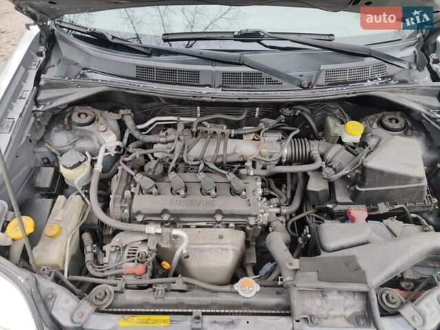 Сірий Ніссан ІксТрейл, об'ємом двигуна 2 л та пробігом 200 тис. км за 5900 $, фото 12 на Automoto.ua