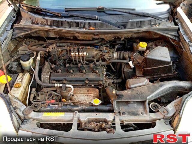 Сірий Ніссан ІксТрейл, об'ємом двигуна 2.5 л та пробігом 240 тис. км за 5800 $, фото 10 на Automoto.ua