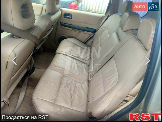 Сірий Ніссан ІксТрейл, об'ємом двигуна 2 л та пробігом 200 тис. км за 4000 $, фото 5 на Automoto.ua