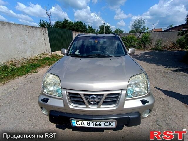 Серый Ниссан ИксТрейл, объемом двигателя 2 л и пробегом 275 тыс. км за 6300 $, фото 5 на Automoto.ua