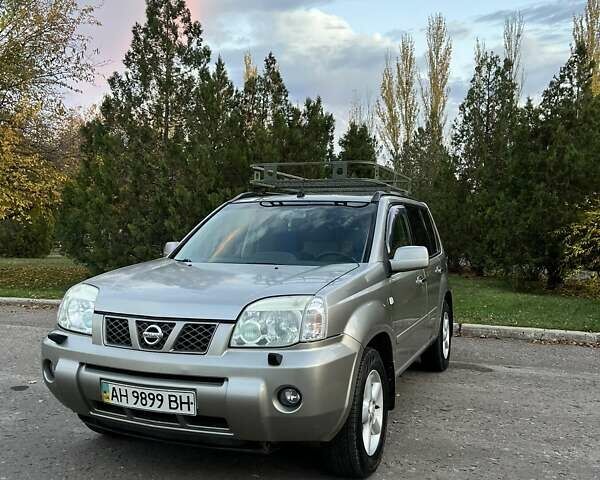 Сірий Ніссан ІксТрейл, об'ємом двигуна 2 л та пробігом 312 тис. км за 5300 $, фото 3 на Automoto.ua