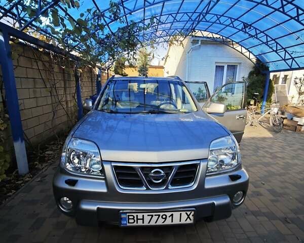 Сірий Ніссан ІксТрейл, об'ємом двигуна 2 л та пробігом 320 тис. км за 5500 $, фото 11 на Automoto.ua