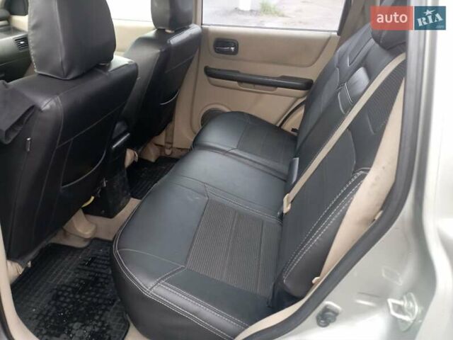 Серый Ниссан ИксТрейл, объемом двигателя 2 л и пробегом 335 тыс. км за 3100 $, фото 1 на Automoto.ua