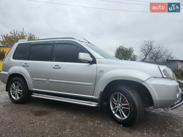 Серый Ниссан ИксТрейл, объемом двигателя 2.5 л и пробегом 450 тыс. км за 7000 $, фото 6 на Automoto.ua