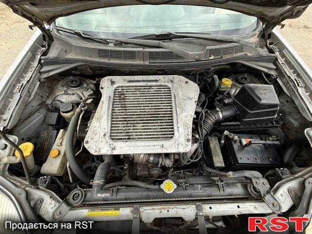 Серый Ниссан ИксТрейл, объемом двигателя 2.2 л и пробегом 266 тыс. км за 3400 $, фото 8 на Automoto.ua