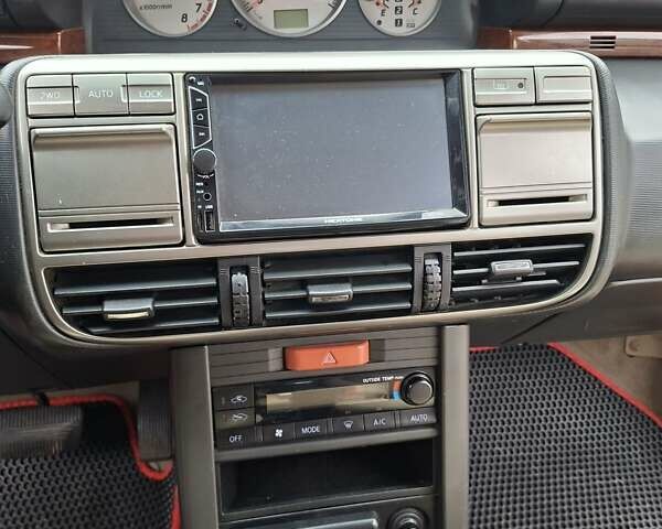 Серый Ниссан ИксТрейл, объемом двигателя 2.49 л и пробегом 286 тыс. км за 5800 $, фото 17 на Automoto.ua