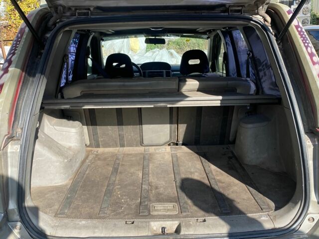 Серый Ниссан ИксТрейл, объемом двигателя 2.2 л и пробегом 383 тыс. км за 4860 $, фото 6 на Automoto.ua