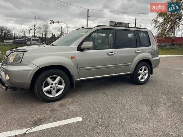 Серый Ниссан ИксТрейл, объемом двигателя 2 л и пробегом 336 тыс. км за 5750 $, фото 11 на Automoto.ua