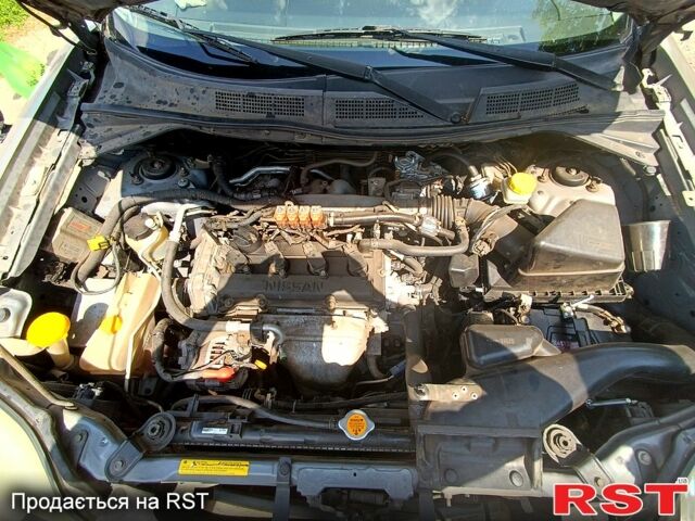 Серый Ниссан ИксТрейл, объемом двигателя 2 л и пробегом 275 тыс. км за 6300 $, фото 6 на Automoto.ua