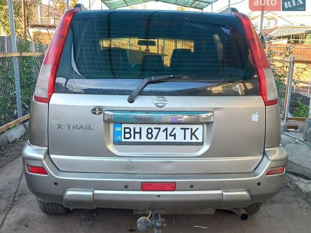 Сірий Ніссан ІксТрейл, об'ємом двигуна 2 л та пробігом 253 тис. км за 5500 $, фото 1 на Automoto.ua