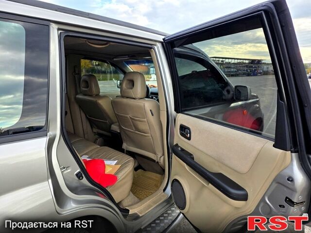 Серый Ниссан ИксТрейл, объемом двигателя 2 л и пробегом 220 тыс. км за 5800 $, фото 6 на Automoto.ua