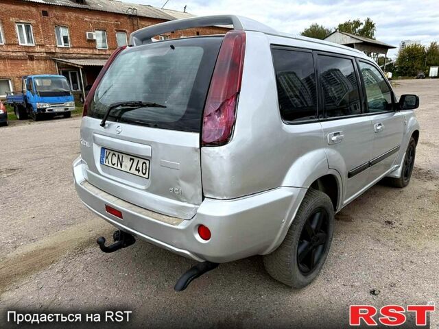 Серый Ниссан ИксТрейл, объемом двигателя 2.2 л и пробегом 266 тыс. км за 3400 $, фото 5 на Automoto.ua