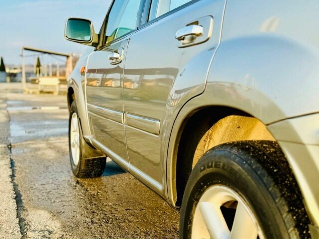 Серый Ниссан ИксТрейл, объемом двигателя 2.2 л и пробегом 280 тыс. км за 3750 $, фото 4 на Automoto.ua