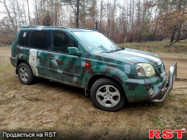 Серый Ниссан ИксТрейл, объемом двигателя 22 л и пробегом 375 тыс. км за 2900 $, фото 5 на Automoto.ua
