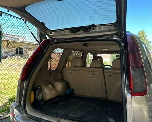 Серый Ниссан ИксТрейл, объемом двигателя 2.2 л и пробегом 281 тыс. км за 6500 $, фото 6 на Automoto.ua