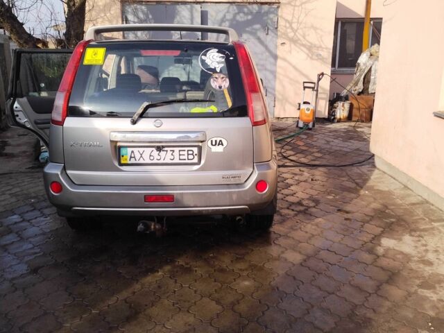 Серый Ниссан ИксТрейл, объемом двигателя 2.5 л и пробегом 239 тыс. км за 5800 $, фото 1 на Automoto.ua