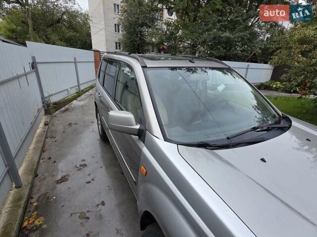 Серый Ниссан ИксТрейл, объемом двигателя 2 л и пробегом 335 тыс. км за 4900 $, фото 12 на Automoto.ua