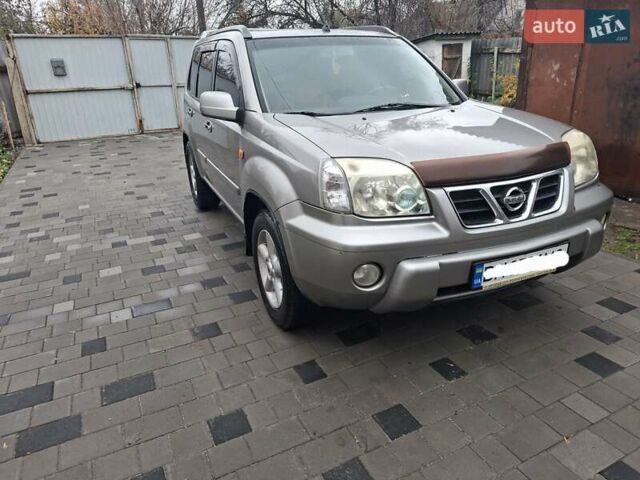 Серый Ниссан ИксТрейл, объемом двигателя 2.49 л и пробегом 286 тыс. км за 5800 $, фото 5 на Automoto.ua