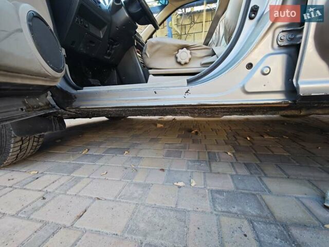 Сірий Ніссан ІксТрейл, об'ємом двигуна 2 л та пробігом 320 тис. км за 5500 $, фото 18 на Automoto.ua