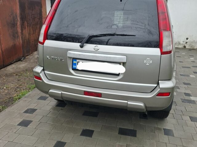 Серый Ниссан ИксТрейл, объемом двигателя 2.5 л и пробегом 286 тыс. км за 5800 $, фото 17 на Automoto.ua