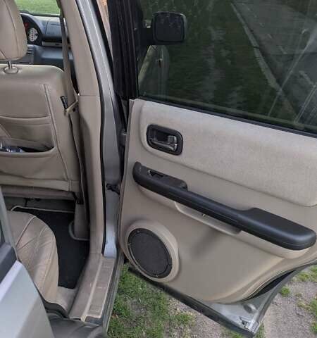 Серый Ниссан ИксТрейл, объемом двигателя 2.5 л и пробегом 193 тыс. км за 6500 $, фото 16 на Automoto.ua