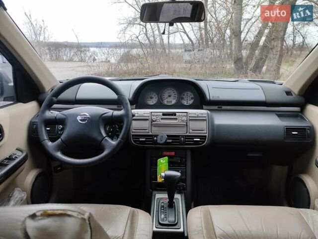 Сірий Ніссан ІксТрейл, об'ємом двигуна 2 л та пробігом 200 тис. км за 5900 $, фото 14 на Automoto.ua