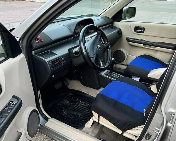 Сірий Ніссан ІксТрейл, об'ємом двигуна 2 л та пробігом 312 тис. км за 5300 $, фото 7 на Automoto.ua