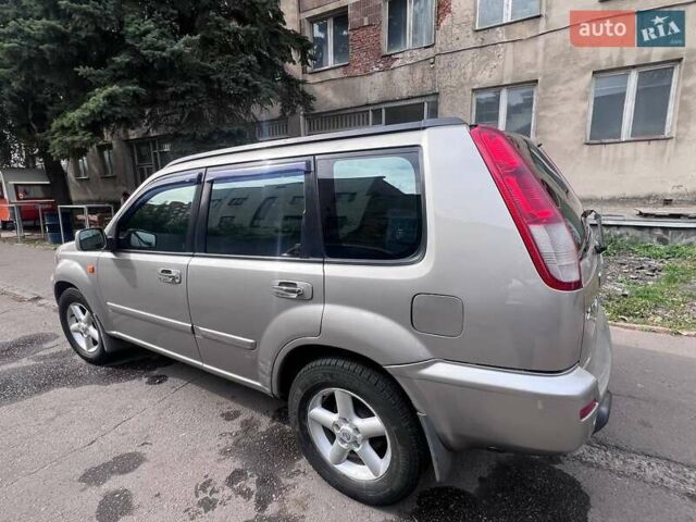 Серый Ниссан ИксТрейл, объемом двигателя 2 л и пробегом 262 тыс. км за 7079 $, фото 18 на Automoto.ua