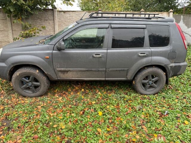 Серый Ниссан ИксТрейл, объемом двигателя 2.2 л и пробегом 290 тыс. км за 4000 $, фото 1 на Automoto.ua