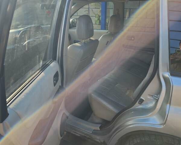 Сірий Ніссан ІксТрейл, об'ємом двигуна 2 л та пробігом 320 тис. км за 5500 $, фото 5 на Automoto.ua