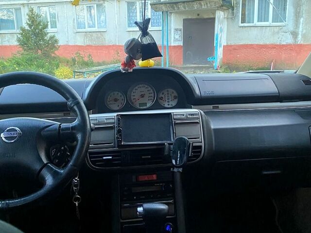 Серый Ниссан ИксТрейл, объемом двигателя 2 л и пробегом 251 тыс. км за 5600 $, фото 8 на Automoto.ua