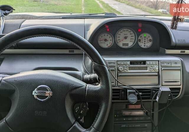 Серый Ниссан ИксТрейл, объемом двигателя 2.5 л и пробегом 193 тыс. км за 6500 $, фото 10 на Automoto.ua