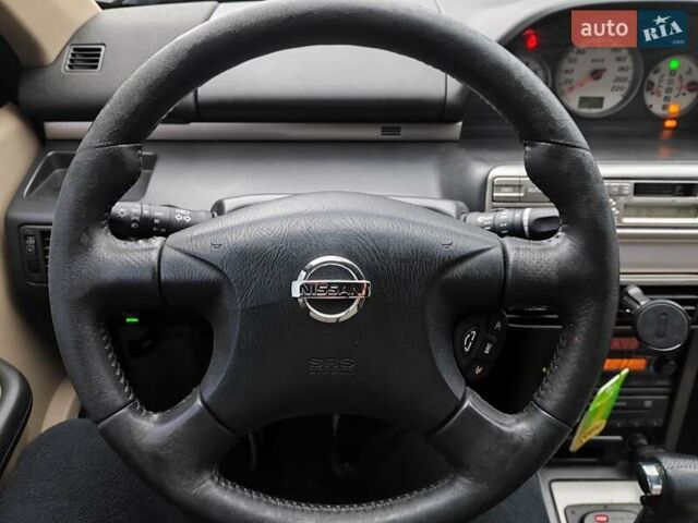 Сірий Ніссан ІксТрейл, об'ємом двигуна 2 л та пробігом 200 тис. км за 5900 $, фото 16 на Automoto.ua