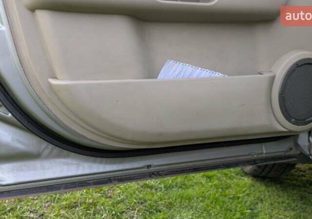 Серый Ниссан ИксТрейл, объемом двигателя 2.5 л и пробегом 193 тыс. км за 6500 $, фото 15 на Automoto.ua