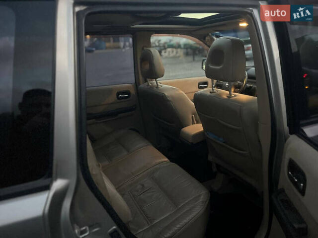 Серый Ниссан ИксТрейл, объемом двигателя 2.5 л и пробегом 320 тыс. км за 4800 $, фото 7 на Automoto.ua