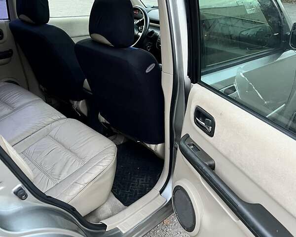 Сірий Ніссан ІксТрейл, об'ємом двигуна 2 л та пробігом 312 тис. км за 5300 $, фото 9 на Automoto.ua