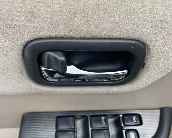 Серый Ниссан ИксТрейл, объемом двигателя 2 л и пробегом 336 тыс. км за 5750 $, фото 12 на Automoto.ua