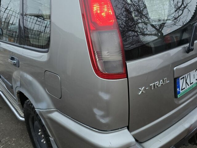 Сірий Ніссан ІксТрейл, об'ємом двигуна 2.2 л та пробігом 314 тис. км за 4500 $, фото 9 на Automoto.ua