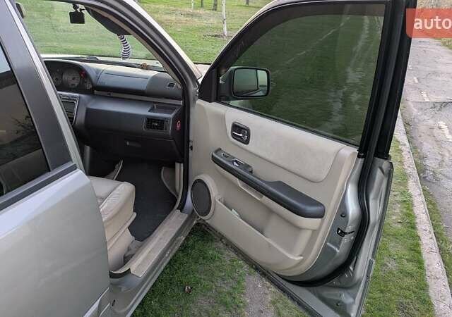 Серый Ниссан ИксТрейл, объемом двигателя 2.5 л и пробегом 193 тыс. км за 6500 $, фото 19 на Automoto.ua